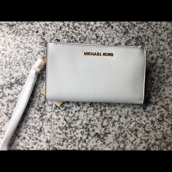 Michael Kors Handbags - Michael Kors White wallet/wristlet